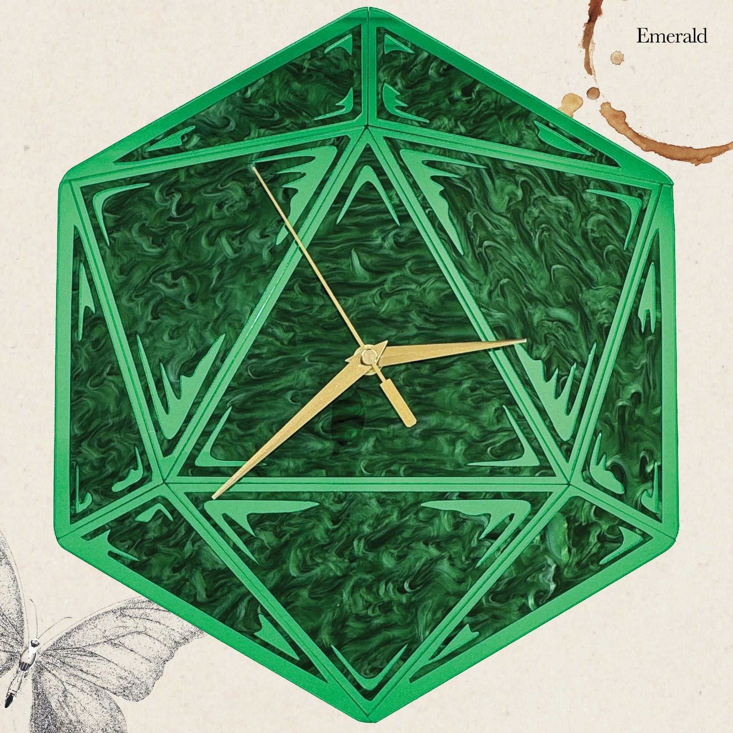 Hexagonal green clock with gold hands on a beige background