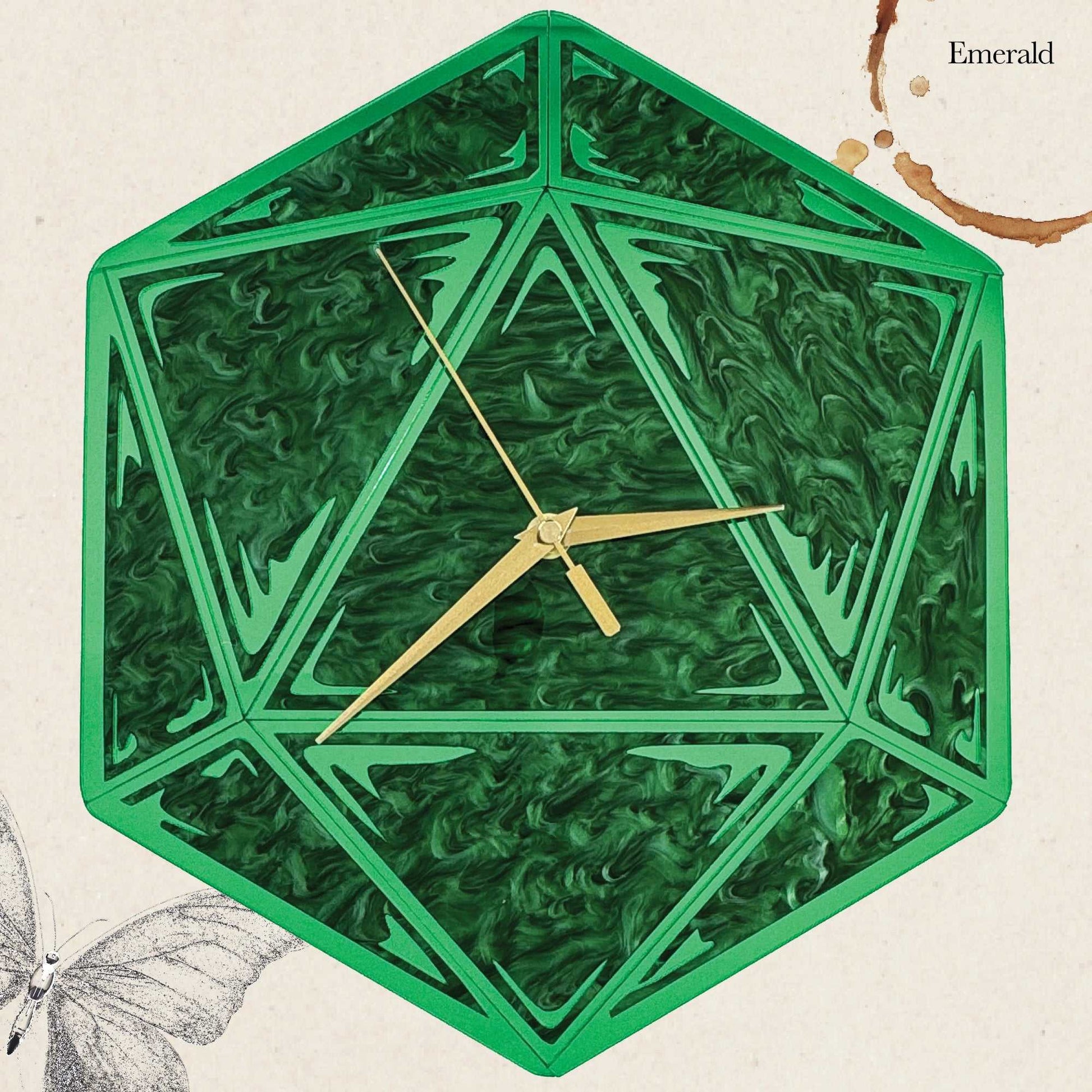 Hexagonal green clock with gold hands on a beige background