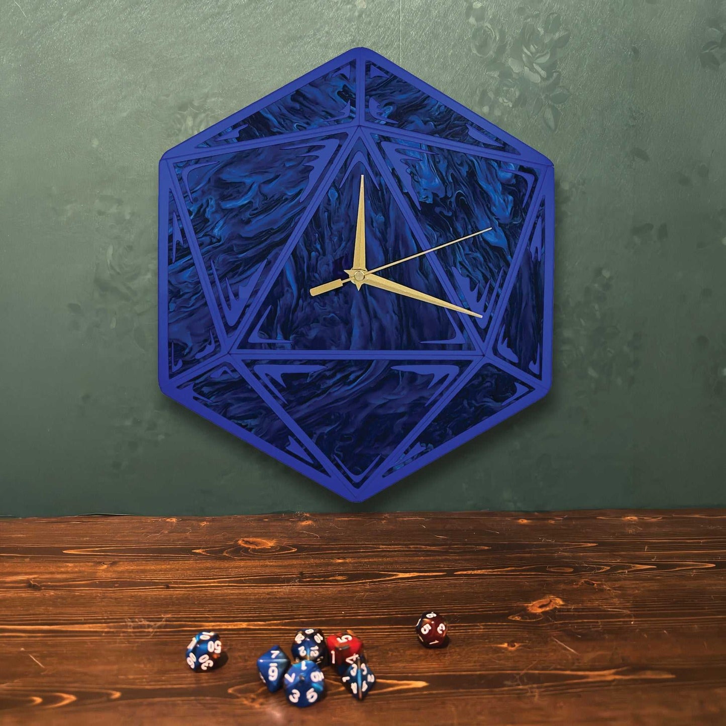 Hexagonal blue wall clock with gold hands on a green wall background